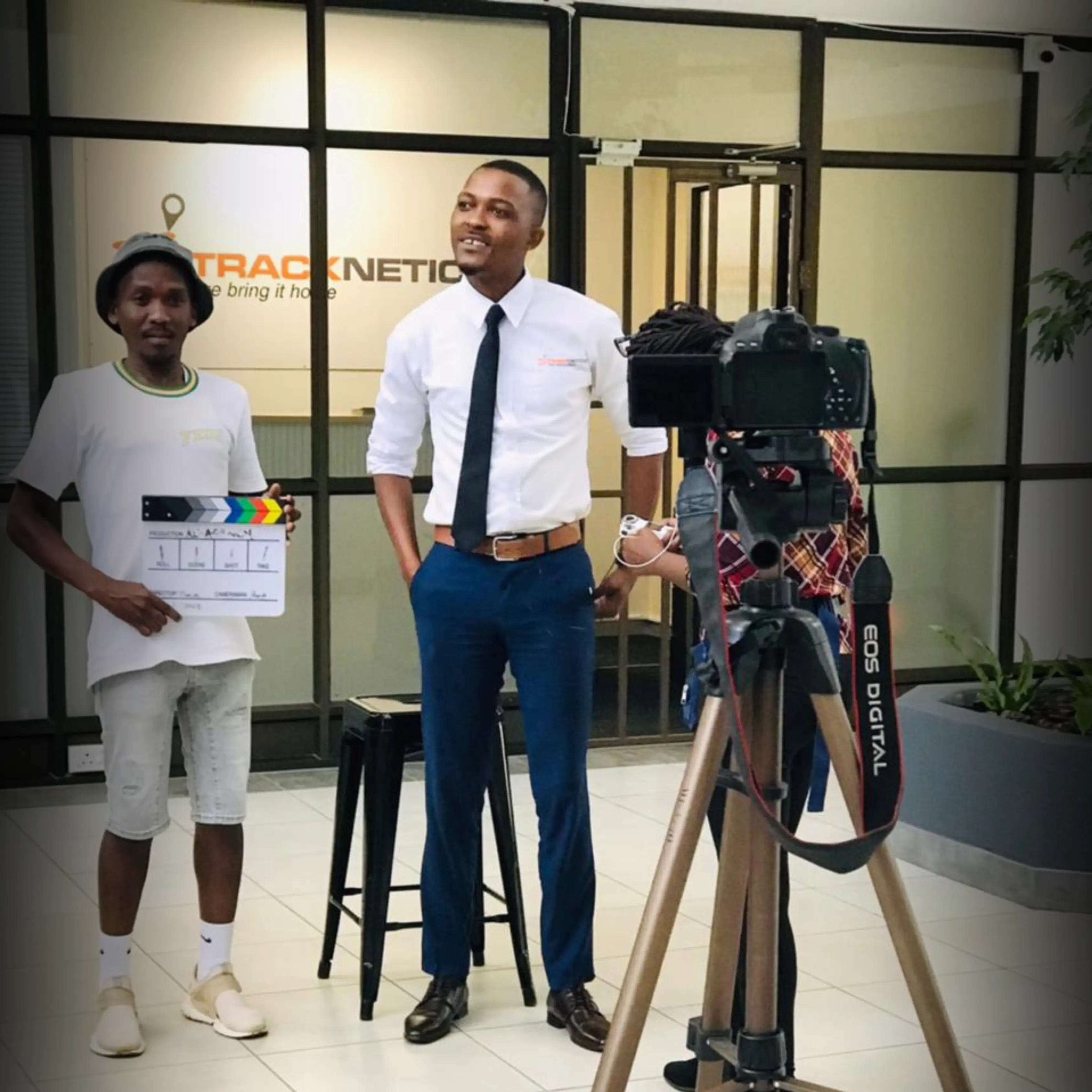 A man editing videos on his desktop